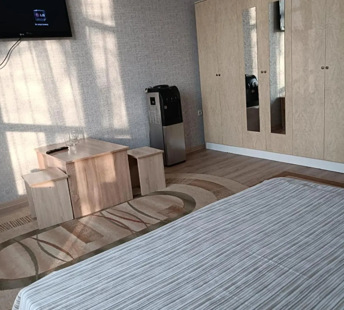 Отель Ровный Almaty Hotel