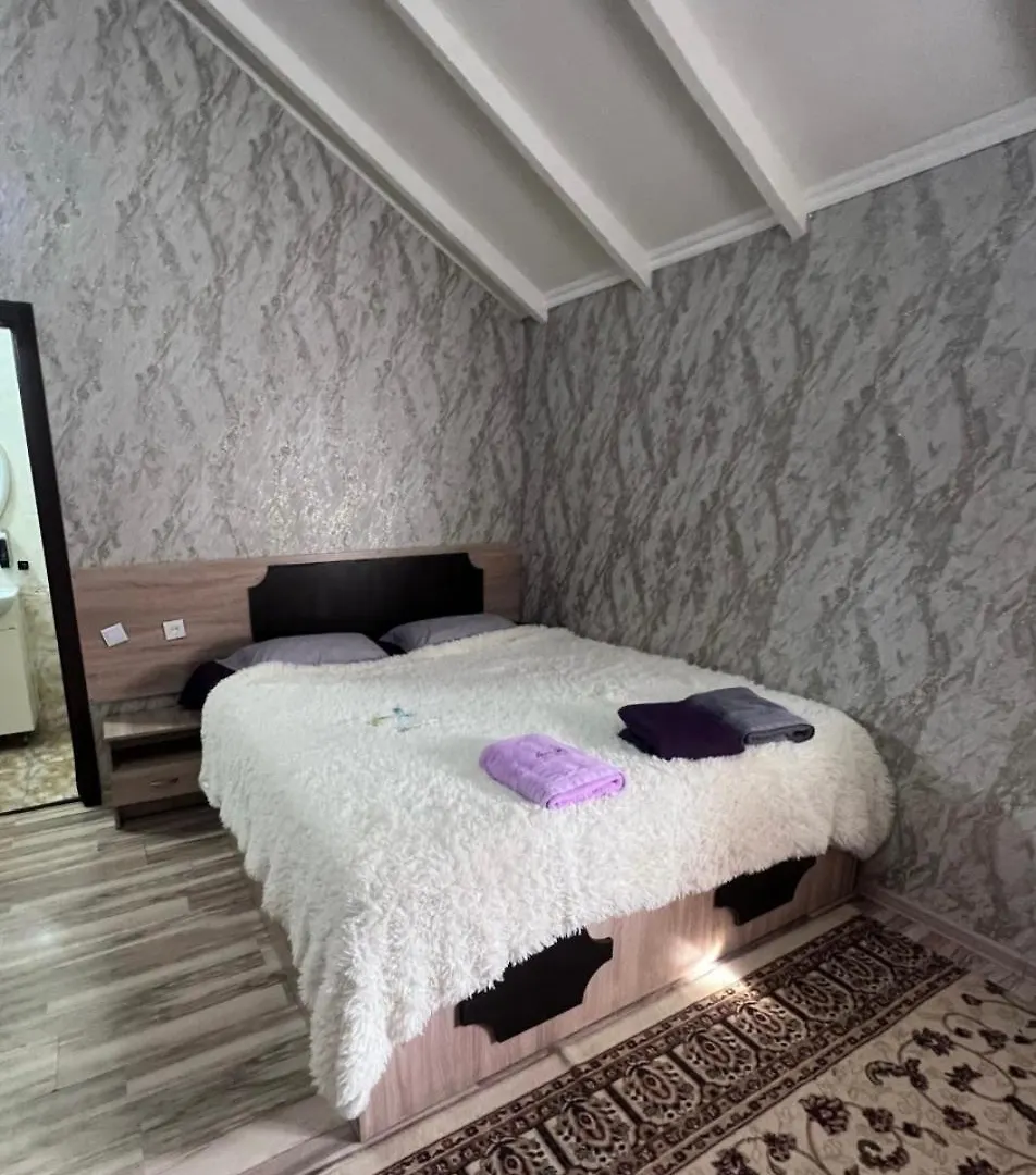 Отель Ровный Almaty Hotel