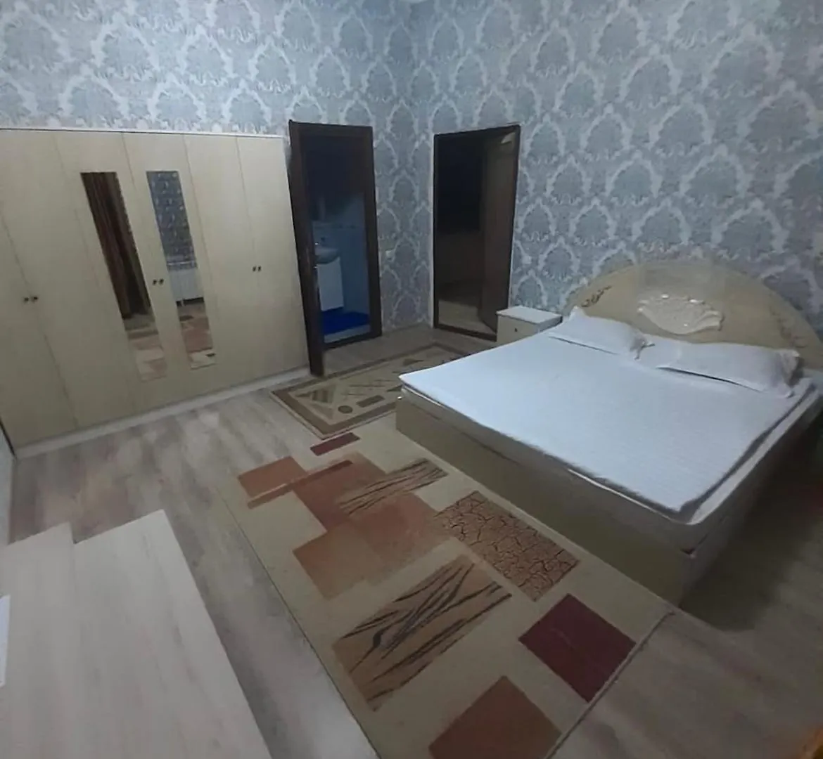 Отель Ровный Almaty Hotel